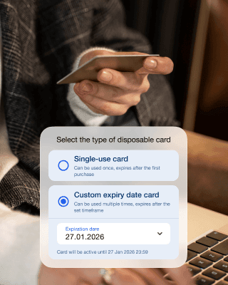 A hand holding a phone, the person is selecting a card type