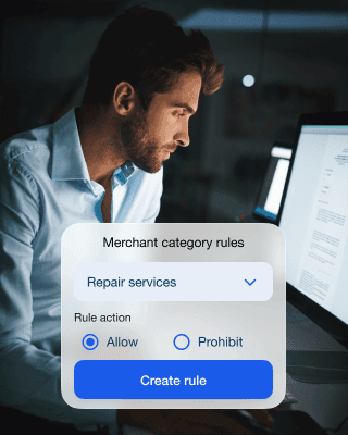 A man selects a merchant category via the software