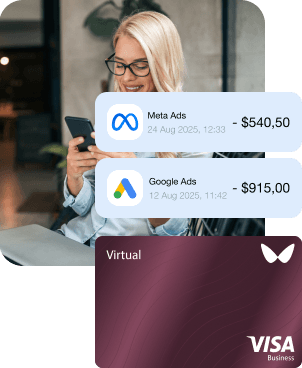 A woman views an advertising campaign's expenses in an app. A virtual business Visa card is visible in the image