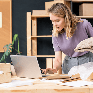 A girl making payment with her laptop