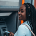 A woman at the ATM